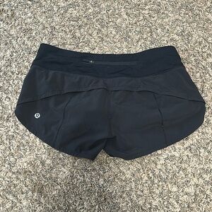 Black Lululemon speed up shorts. Size 2 and 2.5”